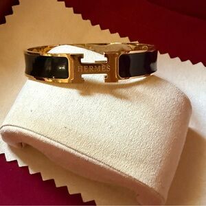 Hermès Gold and Black Enamel Cuff